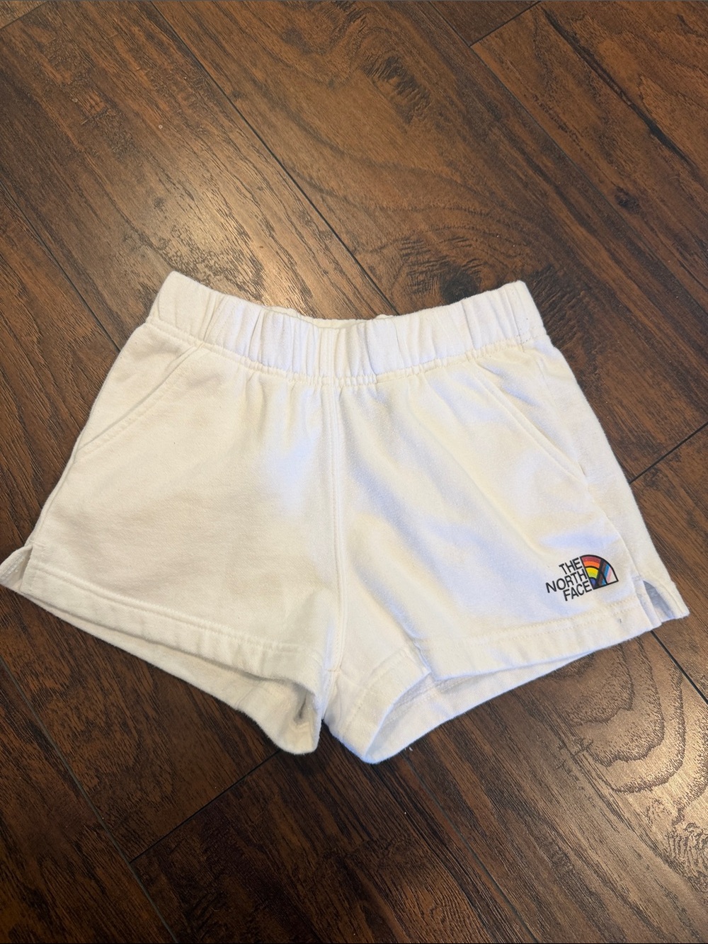 The North Face White Fleece Shorts with Rainbow Half-Dome Logo